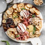 Easy burrata appetizer recipe on a serving board.