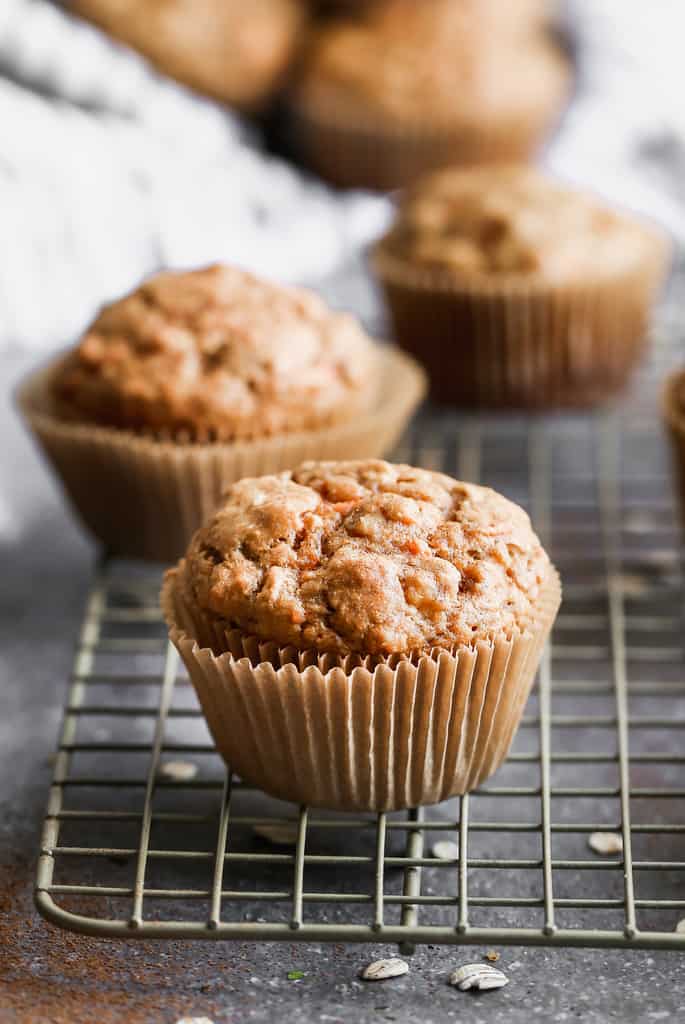 Carrot Muffins freshly baked, cooling on a wire rack.