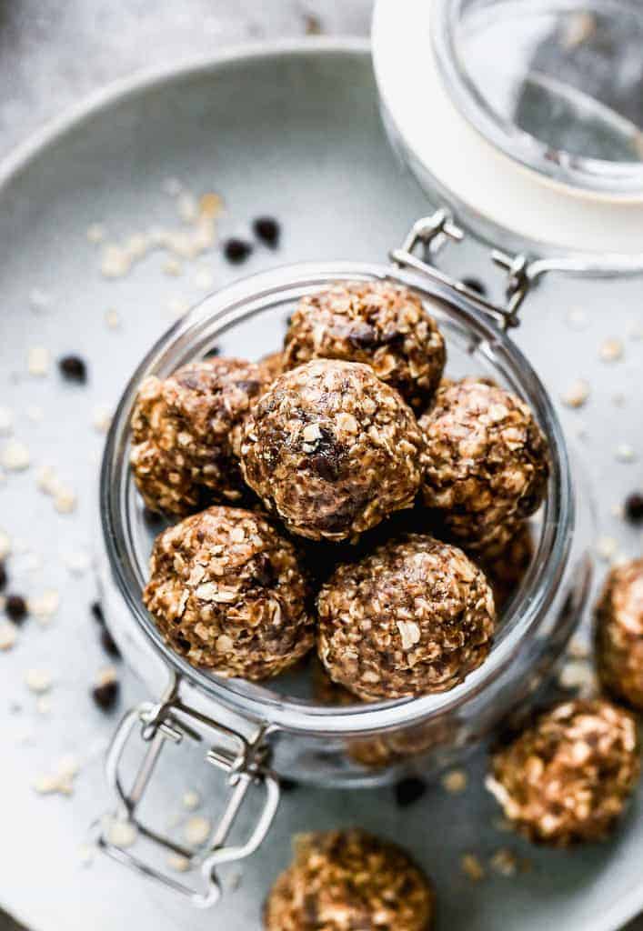 Homemade Granola Bites stacked in a jar.