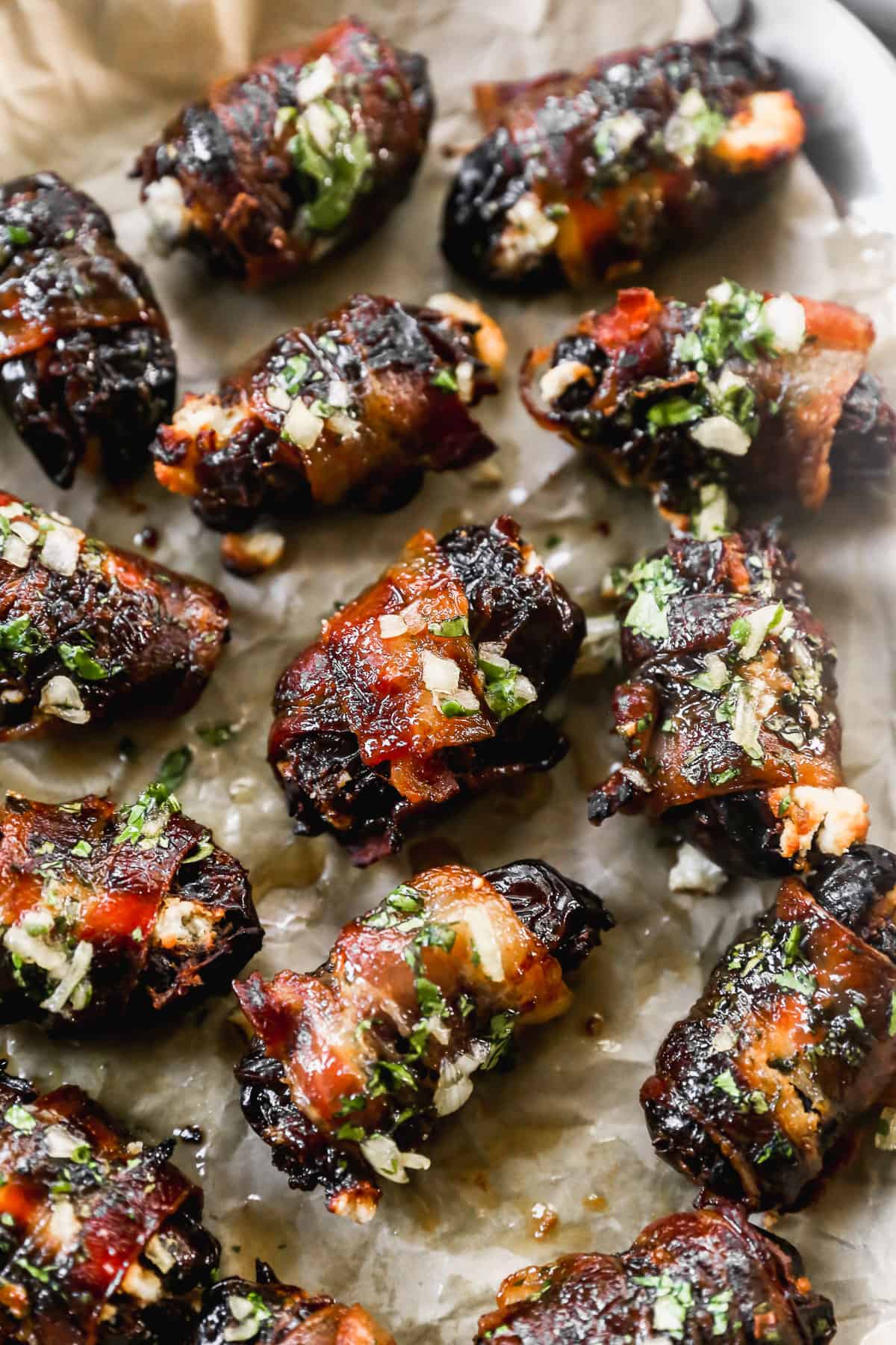 A sheet of easy Bacon Wrapped Dates, freshly baked with a delicious glaze. 