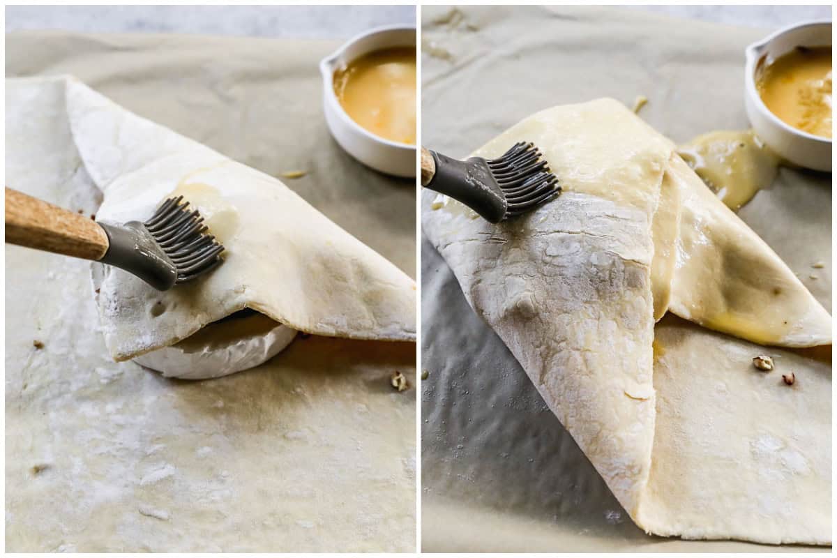 Two images showing a baked brie with jam being wrapped in a puff pastry and brushed with an egg wash. 