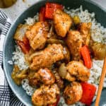 An easy Black Pepper Chicken recipe served over rice, ready to eat.