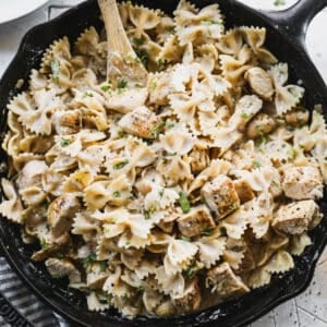 Boursin Pasta with Chicken, served in a cast iron skillet.