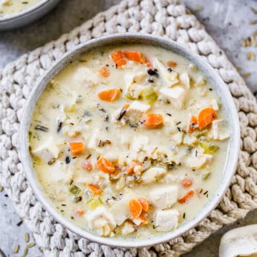 A bowl of creamy Chicken and Wild Rice Soup packed with veggies and ready to enjoy.