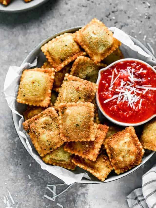 Toasted ravioli served with a side of marinara.