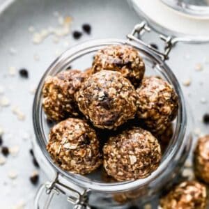 Homemade Granola Bites stacked in a jar.