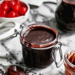 An easy Hot Fudge Recipe in a jar, ready to serve.