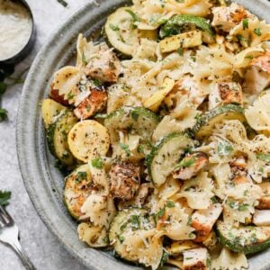 Lemon Chicken Pasta served in a bowl, garnished with parmesan cheese.