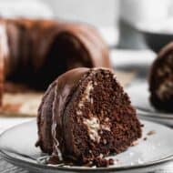 A slice of chocolate macaroon cake on a plate.