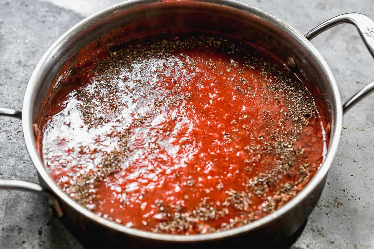 A pot filled with homemade marinara sauce to use for the best Manicotti recipe. 