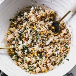 Our version of a Mexican Street Corn Pasta Salad in a serving bowl, ready to serve and enjoy.